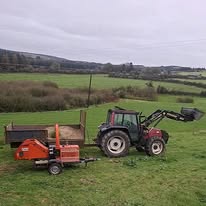 Tractor mowing large grass area — Midwest Garden Maintenance
